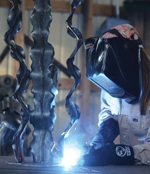 Sarah Stork Working as a Fabricator