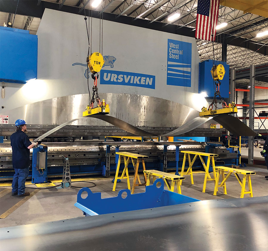 The 1,100-ton, 30-ft. Ursviken press brake includes two programmable CNC front sheet supports, minimizing handling.