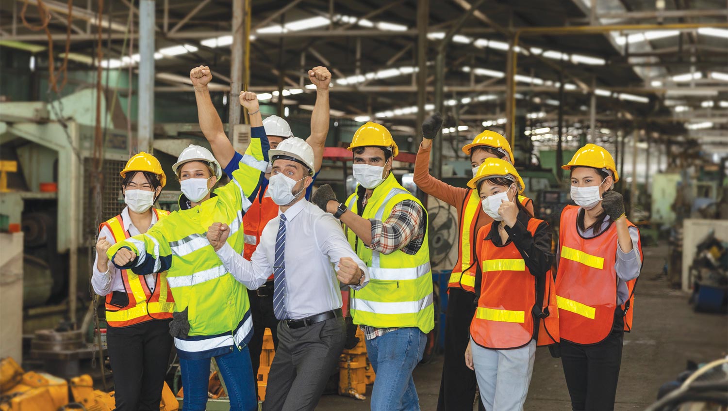 O’Neal Manufacturing Services workers take a group celebratory picture